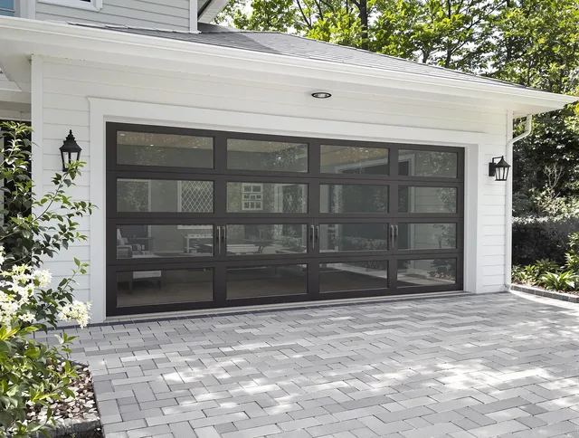 Daytona Beach Garage Door Repair design specialist presenting custom garage door options to Daytona Beach homeowner
