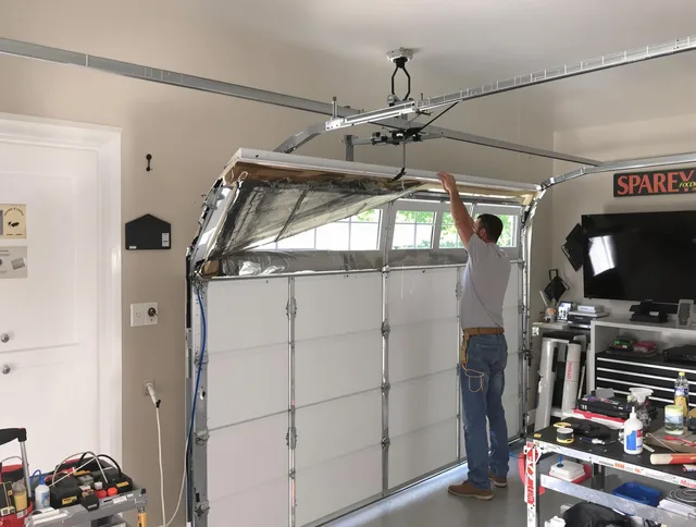 Garage door section replacement by Daytona Beach Garage Door Repair in Daytona Beach